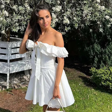 Evienne Off-Shoulder Corset Mini Dress – White Ruffle Bow Summer Dress for Garden Parties and Holiday Looks